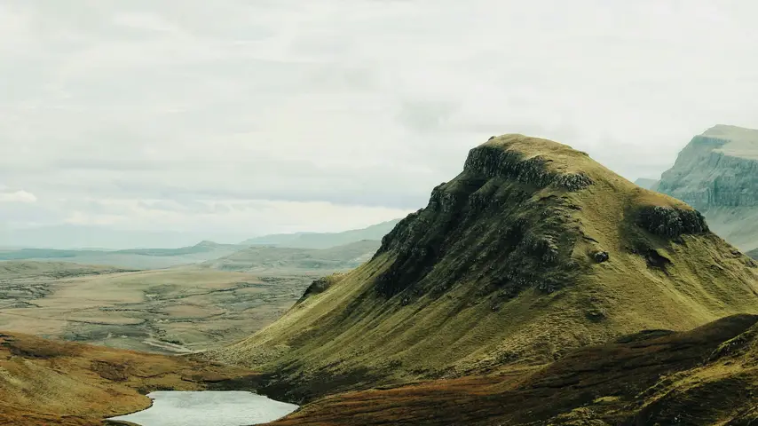 mountains next to a lake